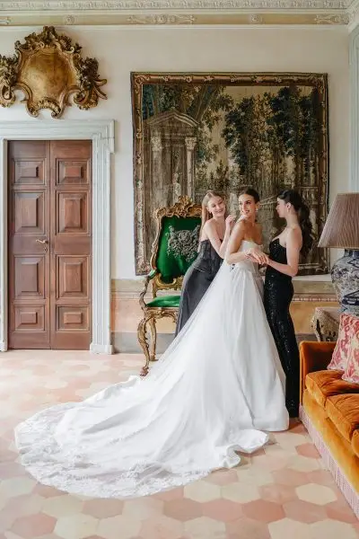 bride prepares for her wedding in a historic, luxury venue